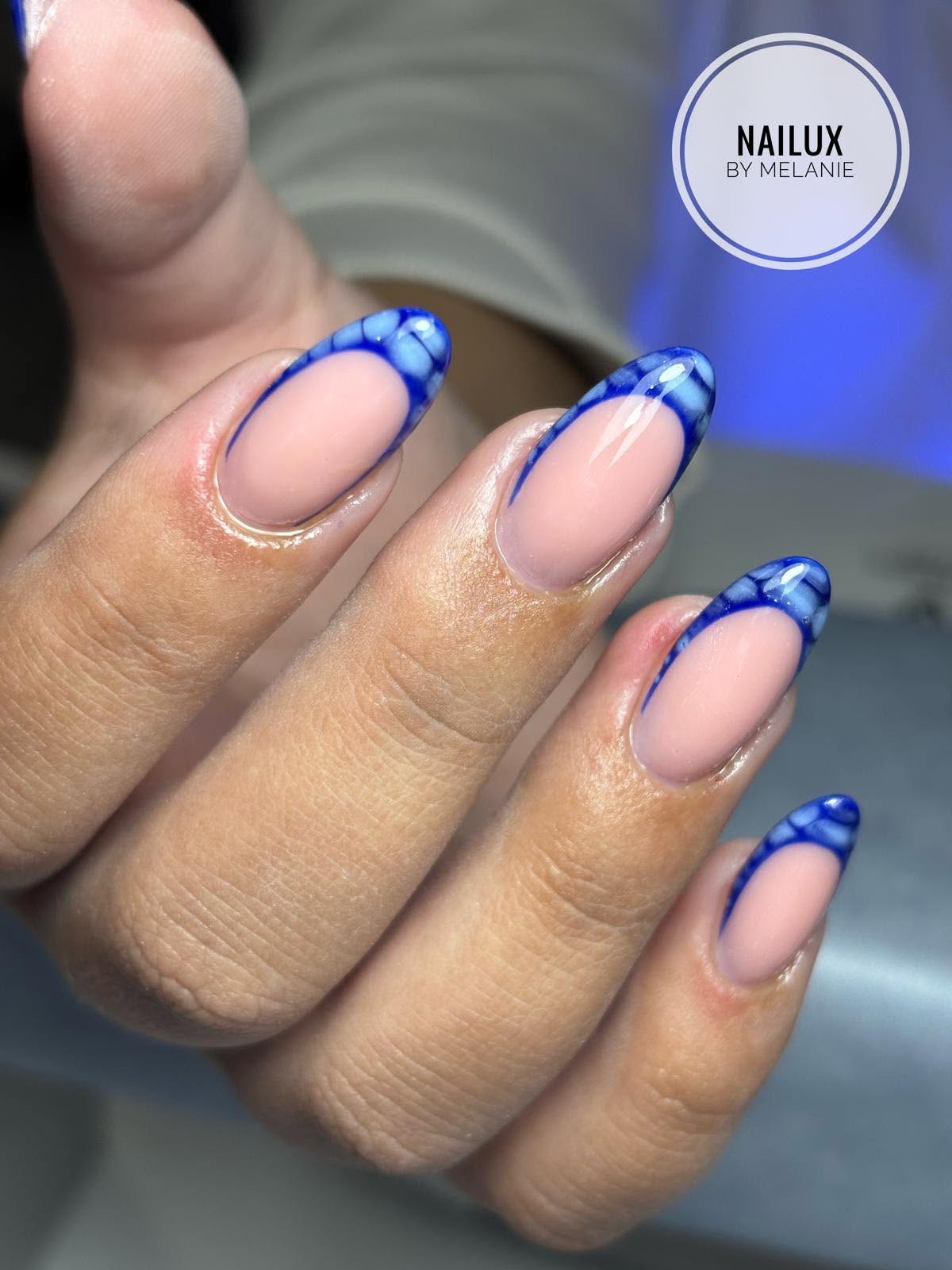 Blue marble French tip gel nails by NAILUX nail technician Żebbuġ Malta